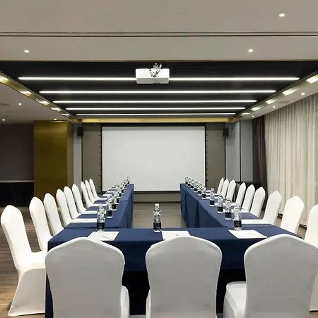 Holz Hotel Shenyang Bagian luar foto