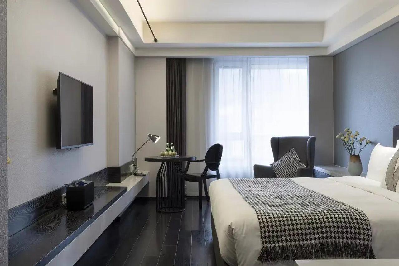 Holz Hotel Shenyang Bagian luar foto